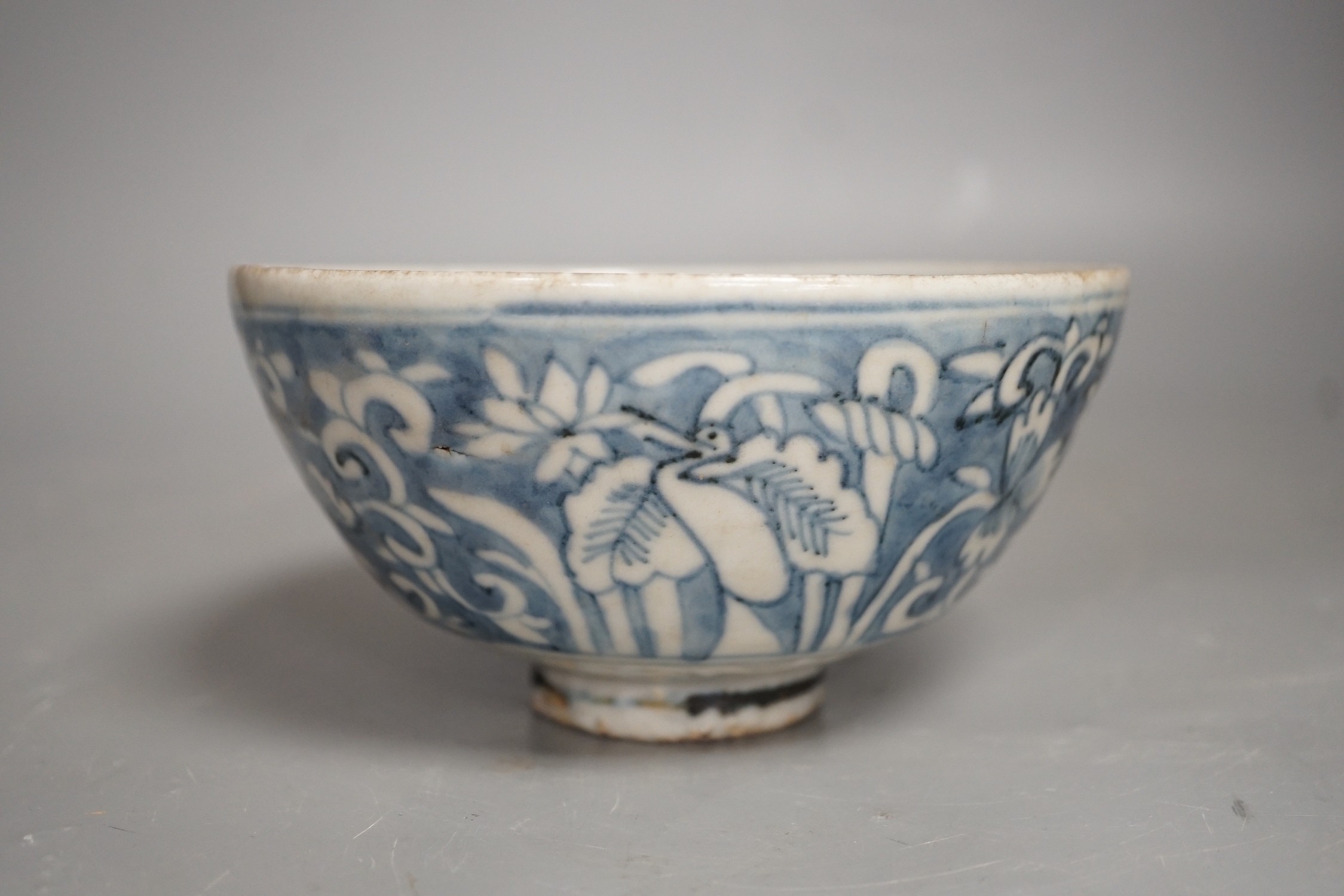 A Chinese late Ming blue and white ‘egret and Lotus’ bowl, Zhangzhou kilns, 14.7cm